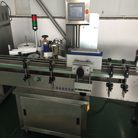 Machine d'étiquetage automatique de bouteilles rondes JF-T1 pour bouteilles en plastique