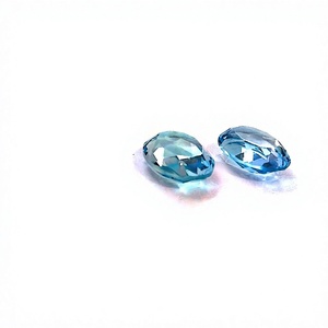 พลอยโทแพซสีฟ้าธรรมชาติ ขนาด 12x16 มม. รูปไข่เจียระไนแบบเหลี่ยมเพชรพลอย  รับรองโดยบุคคลที่สาม ขายส่งโดยโกปิกา เอ็กซ์พอร์ตส์ ฟายน์จิวเวลรี่ - Product Image 2