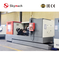 Centre d'usinage automatique Fanuc BR25LDY de moyenne capacité avec chargeur de barres et système de convoyage de copeaux