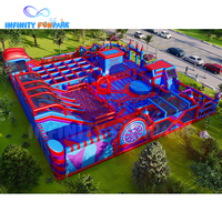 Glissière géante d'île d'aventure gonflable bleu rouge d'enfants nouvellement populaires + parc à thème gonflable de service d'OEM de piscine à balles
