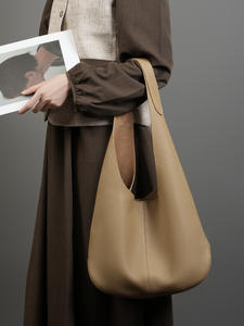 กระเป๋าโท้ทผู้หญิงสุดหรู สีพื้น ขนาดใหญ่ วัสดุ PU แบบเปิดปิด ดีไซน์ทรงถัง สะพายไหล่หรือถือได้ เหมาะสำหรับฤดูใบไม้ผลิและฤดูร้อน - Product Image 3