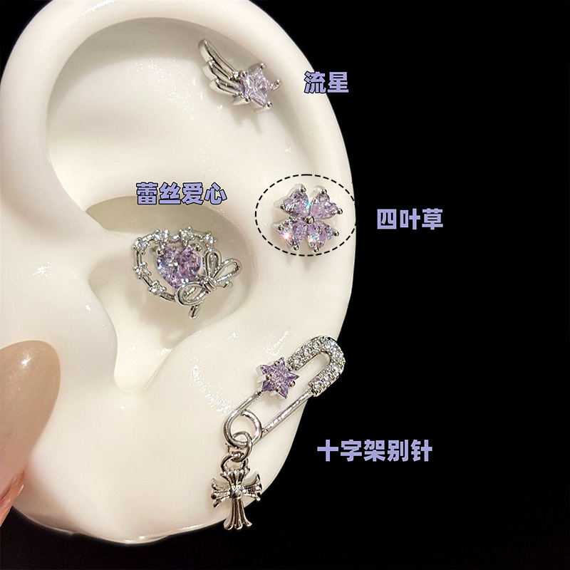 Purple four-leaf clover single