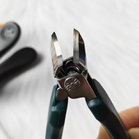 Coupe-ongles anti-éclaboussures en acier inoxydable à pointe inclinée et grande ouverture pour les ongles des bébés - Manucures sans effort pour la maison