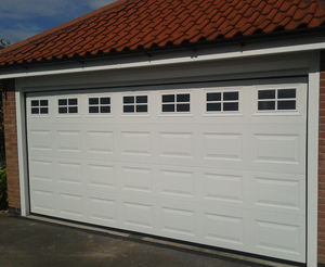 Porta del garage all'ingrosso isolata automatica con la porta pedonale per le case - Product Image 3