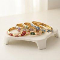 Nouveau produit : Bracelet jonc ajouré en alliage plaqué or 18 carats avec zircon, motif fleur et grain de lotus, style vintage