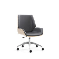 Chaise de bureau de direction en cuir véritable ergonomique de luxe à dossier moyen Vente en gros