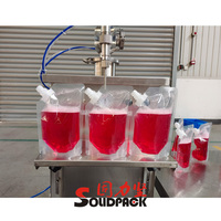 Solidpack machine de remplissage volumétrique à piston vertical semi-automatique pour bouteilles d'huile en pâte liquide avec mélangeur