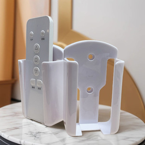 Caja de almacenamiento para mandos a distancia, organizador de escritorio de plástico para mandos a distancia y artículos pequeños, montable en pared, sin agujeros - Product Image 1