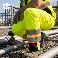 Pantalon de travail extérieur personnalisé JIADE haute visibilité en maille avec fermetures éclair latérales bidirectionnelles pour le personnel aéroportuaire et l'entretien des pistes en été chaud