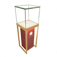 Comptoir de présentation de bijoux haut de gamme en métal doré pour magasin de bijoux sur mesure, design de mobilier de kiosque mural pour bijoux