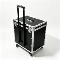 Valise de transport professionnelle noire en aluminium sur roulettes avec poignée télescopique, couvercle alvéolé et insert en EVA