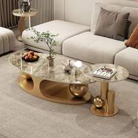 Italienischer Stil Glänzender Stein- & Metall-Oval-Couchtisch-Set Modernes Design Leichter Luxus Umweltfreundliche Wohnmöbel