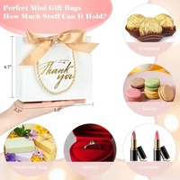 Cosmétique de luxe personnalisé shopping merci sac en papier emballage Saint Valentin feuille d'or Logo sac cadeau avec poignée et ruban