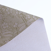Nouveau cuir PVC imprimé de 1,0 mm d'épaisseur, fond brossé, motif de fleurs en relief, décoration de vêtements, bagages, chaussures, canapé/sac