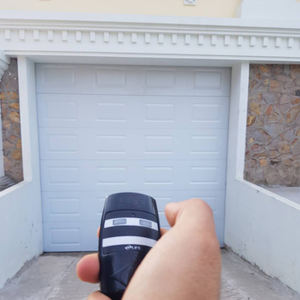 Puerta de garaje eléctrica, control automático, 12 pies por 10 pies - Product Image 1