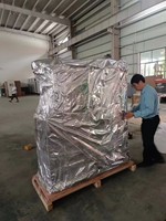 Solution de stockage de palettes avec distributeurs de palettes en plastique pour l'emballage alimentaire (cartons et caisses) par machine AGV