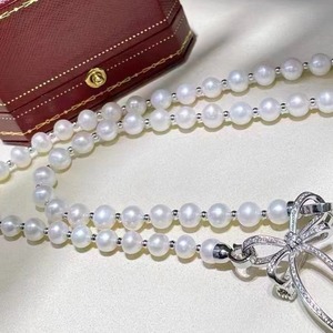 Collier au tempérament doux, une paire de chaînes de clavicule en perles d'eau douce naturelles avec broche à nœud polyvalente, élégant et polyvalent - Product Image 3