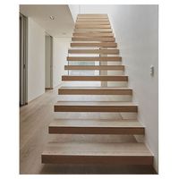 Escalier suspendu minimaliste avec support invisible en acier carbone et éclairage LED d'ambiance, sur mesure pour résidence en immeuble de grande hauteur