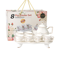 Service à thé à café en porcelaine de couleur blanche de Style européen de luxe 8 pièces avec théière en céramique plaquée or et ensemble de tasses