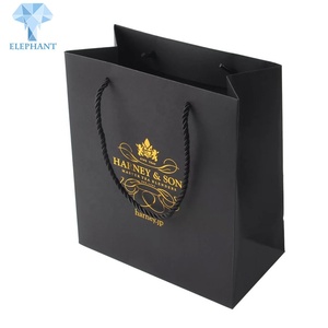 Custom Logo Gold Stamping Printed Luxury Flat Bottom Matte Black Kraft Shopping <b>Gift</b> Paper Bag - Product Image 1