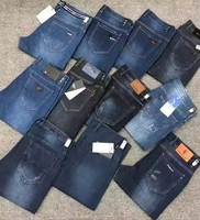 Vente en gros d'usine, nouveaux jeans skinny déchirés en denim de printemps pour hommes, coton/polyester, surplus de stock, liquidation
