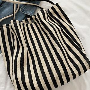 Nouveau produit : Sac à bandoulière rayé simple et frais, sac fourre-tout décontracté en toile grande capacité pour le shopping et les voyages - Product Image 6