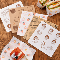 Logo personnalisé papier résistant à l'huile pour hamburger de qualité alimentaire emballage d'épicerie papier d'emballage anti-graisse frites restauration rapide papier sulfurisé