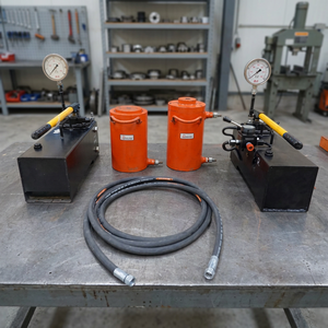 Cylindre de vérin hydraulique avec pompe manuelle, manomètre et tuyau pour tests de résistance - Product Image 1