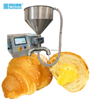 Machine d'injection de chocolat à la crème de pain de croissant de gâteau tiramisu de qualité supérieure utilisée à la main pour les boulangeries utilisant de la farine de lait et d'eau