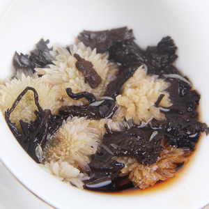 Vente en gros de gâteau au thé Shu Puer 100 grammes de chrysanthème mûr <span class=keywords><strong>Pu</strong></span> <span class=keywords><strong>Er</strong></span> Ju Hua Puerh Yunnan qi Zi Bing Cha <span class=keywords><strong>Pu</strong></span> fermenté <span class=keywords><strong>Er</strong></span> Cha Bing - Product Image 6