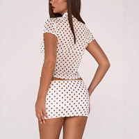 Ensemble 2 pièces en maille à pois pour femme, haut à manches courtes avec découpe en forme de clé et mini-jupe taille basse, tenue assortie pour soirée d'été