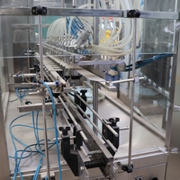Machine de remplissage linéaire entièrement automatique d'occasion en acier inoxydable pour bouteilles, idéale pour l'huile comestible et les jus – Équipement de mise en bouteille quotidien