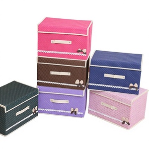 Boîte de rangement pour vêtements en tissu avec motif nœud en forme de point de sésame rectangulaire - Organisateur de bureau portable anti-poussière et anti-humidité - Product Image 1