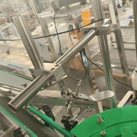 Machine de capsulage automatique pour bouteilles en verre et bouteilles d'huile avec bouchons en aluminium ROPP
