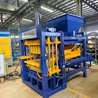 Machine de production de blocs de béton QT4-15B pour la fabrication de briques creuses