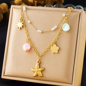 Elegante Collar de Acero Inoxidable Chapado en Oro con Múltiples Elementos, Cadena para Suéter, Colgante en Espiral con Corazón, Cristal, Mariposa y Flor - Product Image 1