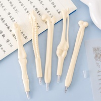 Stylos fantaisie en forme d'os, accessoires pour infirmières, stylos squelette, stylos à bille en forme de doigt, pour artistes, médecins, infirmières, école, bureau