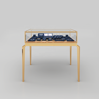 Comptoir à bijoux en acier inoxydable durable, vitrine haut de gamme en métal et verre avec éclairage LED pour mobilier de showroom de vente au détail