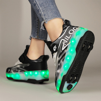 Chaussures de roller à 4 roues pour enfants, semelle extérieure en TPR, tige en maille respirante, design noir et blanc, sport, plein air, été, semelle intérieure en EVA, garçons