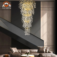 Lustre en cristal Golden Branch pour longue cage d'escalier, avec cristaux en forme de goutte d'eau, pour villa de luxe, escalier en colimaçon, hall à plafond haut