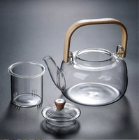 Théière en verre résistant à la chaleur avec poignée en bambou faite à la main en verre à haute teneur en borosilicate avec passoire en verre 900ml