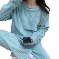 Ensemble de pyjama pour femmes en polyester thermique d'hiver, col rond, motif uni, manches longues, style doux et mignon, vente en gros