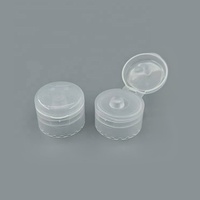 Vente en gros Capsules transparentes personnalisées pour bouteilles à bas prix Capuchon lisse en plastique transparent pour bouteilles à rabat