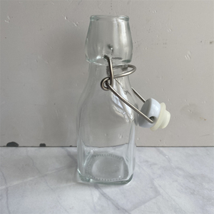 Bouteille en verre carrée de 50 ml, 100 ml, 3,5 oz pour eau, jus, bière, liqueur, décoration d'intérieur, avec bouchon à bascule en acier inoxydable 304/201 - Product Image 5