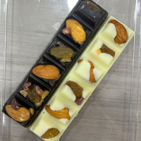 Barre chocolatée aux noix en gros, bonbons au chocolat, chocolat aux amandes et raisins secs