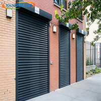 Porte de garage électrique enroulable anti-vent en tôle métallique pour entrepôt et entrée de parking de bâtiment commercial