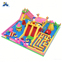 Parc gonflable intérieur commercial avec toboggan, mur d'escalade et parcours d'obstacles pour centre de divertissement pour enfants
