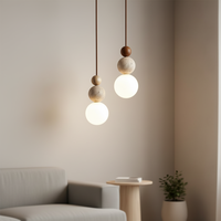 Lustre simple de style crème Wabi-Sabi en pierre de travertin avec abat-jour sphérique pour comptoir, chevet, salle à manger