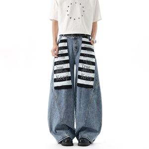 מכנסיים בסגנון אמריקאי High Street Relaxed Vibe מותג טרנדי ג'ינס עם רגליים רחבות עם טלאים מודפסים בצבע בלוק מעוקל בסגנון סכין מעוקלת - Product Image 1