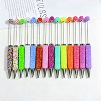 Nouveau stylo rotatif en plastique couleur bonbon entièrement orné de strass, stylo bille DIY en argile et strass, stylo fluorescent 106 très populaire